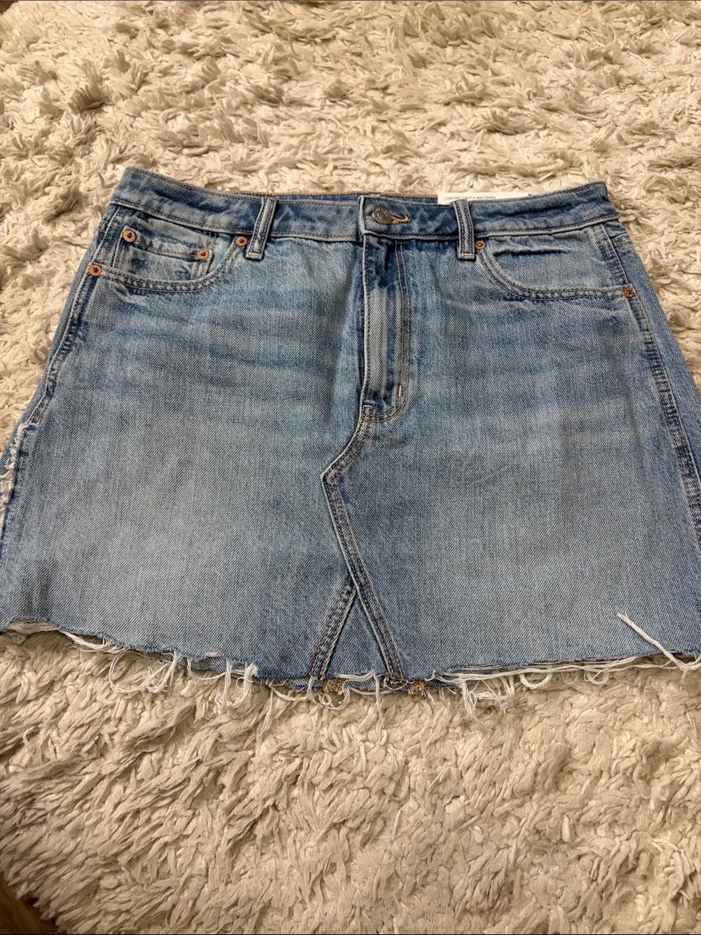American Eagle Outfitters Light Blue Denim Mini Skirt with Frayed Hem